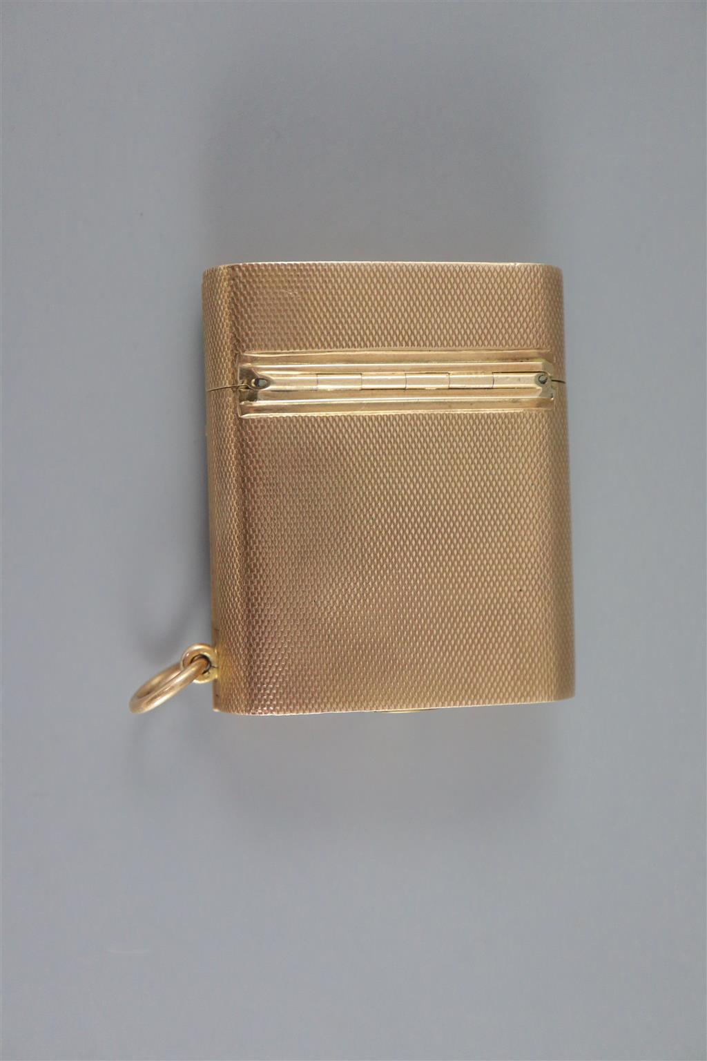 A 1920s engined turned 9ct gold mounted Dunhill lighter, by Finnigans Ltd, London, 1928,